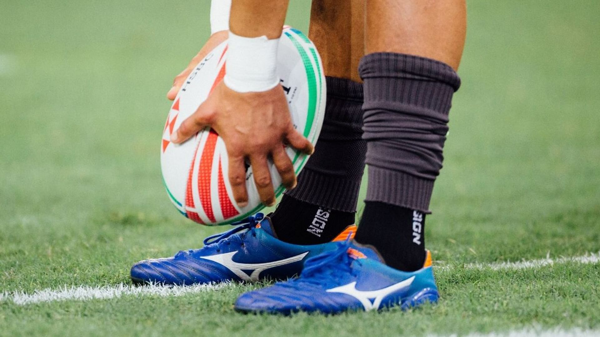 Rugby player preparing the ball near Village Hotels Farnborough