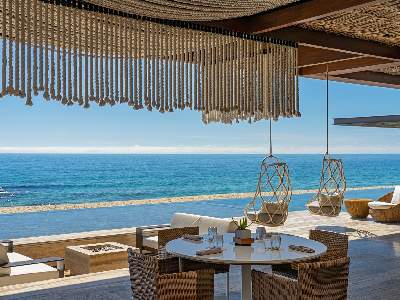 Dining table in Mako with lounge space at The Club at Solaz