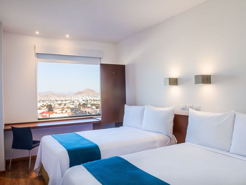 Habitación Doble Superior con ventanas abiertas en One Hotels