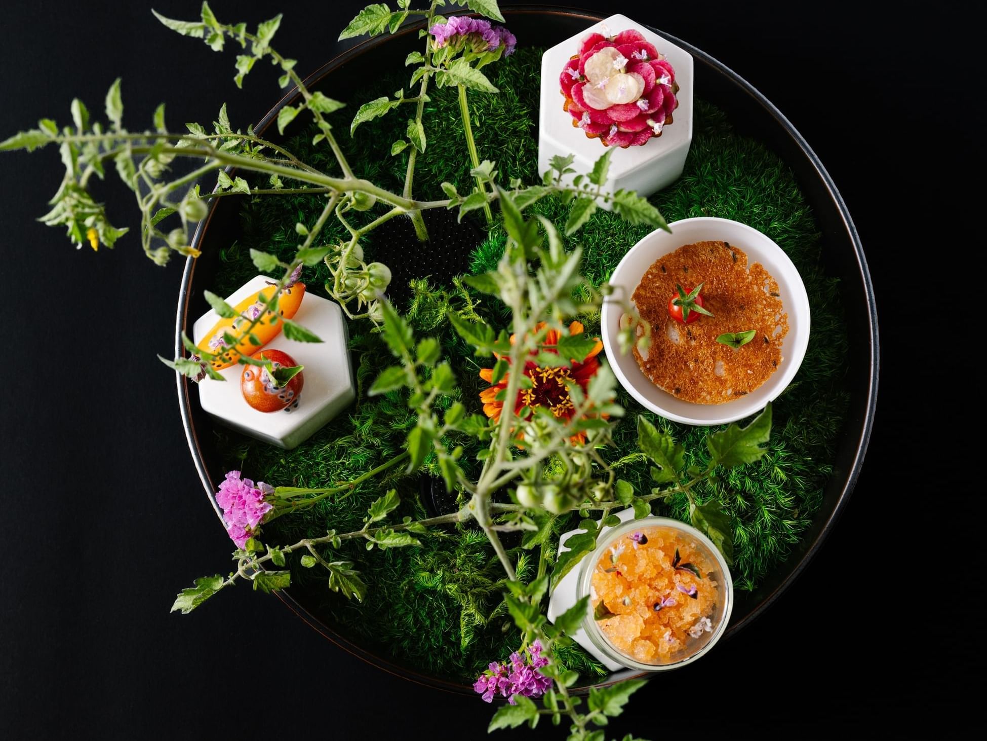 Close-up of fine dishes inspired with flowers in Herons at The Umstead Hotel and Spa