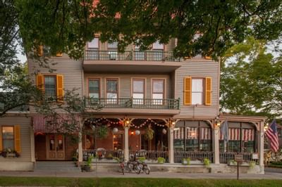 A distant front exterior view of The Inn at Saratoga