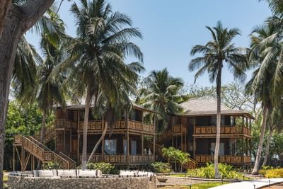 Exterior view of Hotel Isla del Encanto from the garden