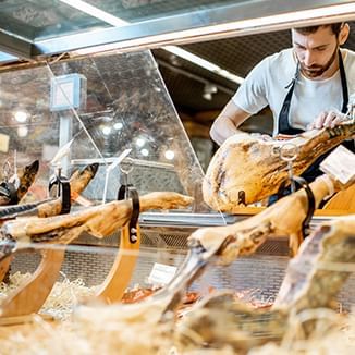 butcher at a meat store