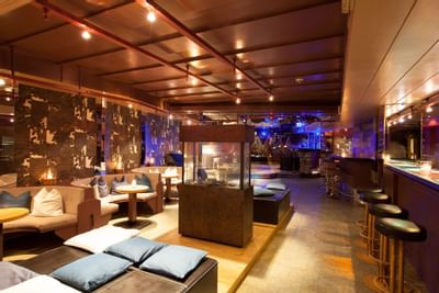 Seating arrangements in Lounge Bar at Hotel Liebes Rot Flueh