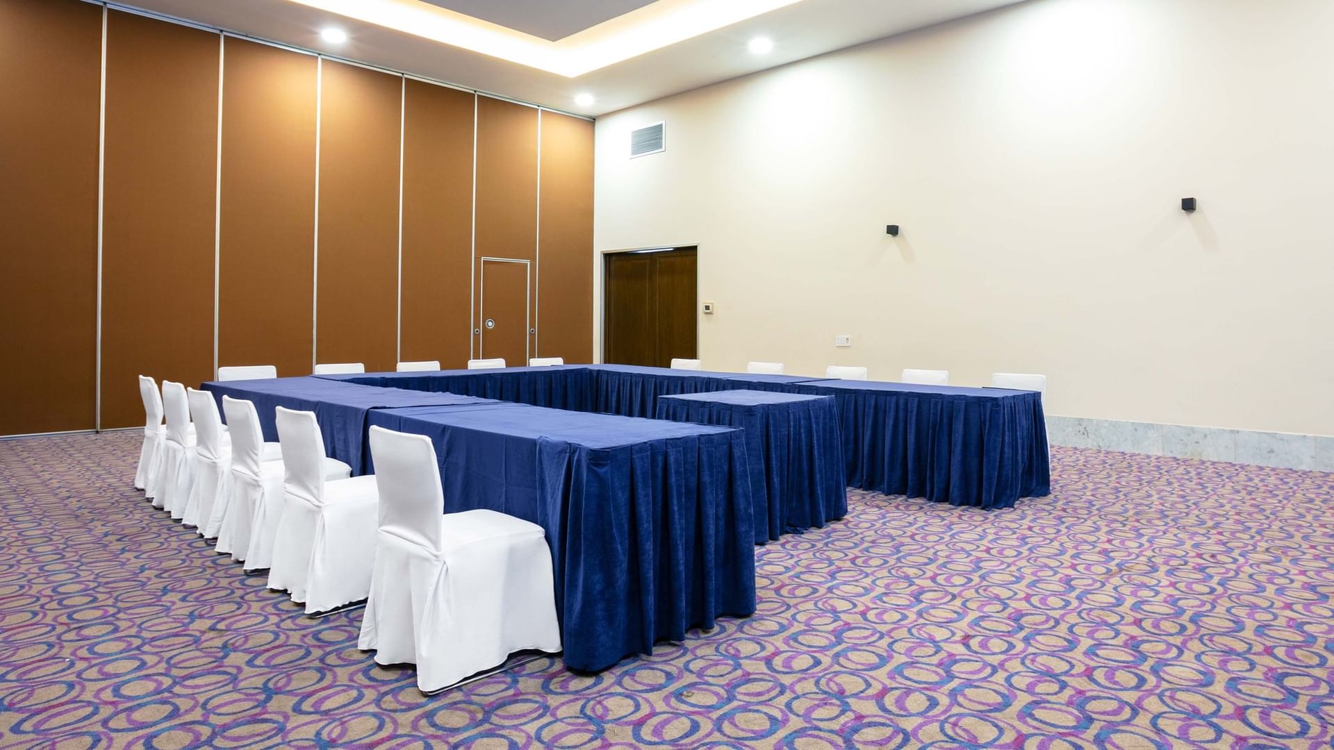 Long table with blue cloth and chairs at Chapultepec event room at Camino Real Guadalajara in Zapopan