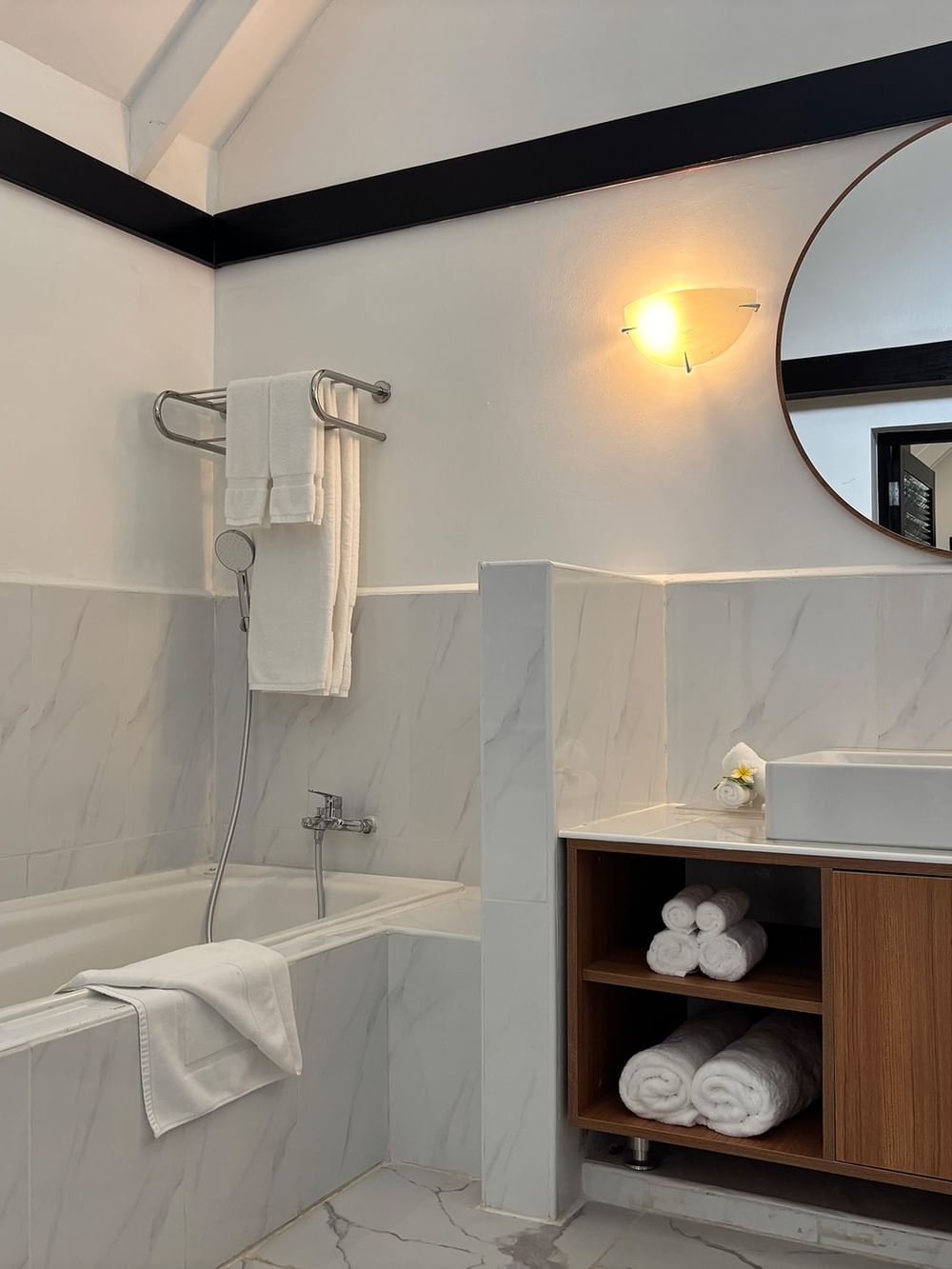 Elegant bathroom with bathtub and modern vanity at Warwick Le Lagon - Vanuatu in Efate.