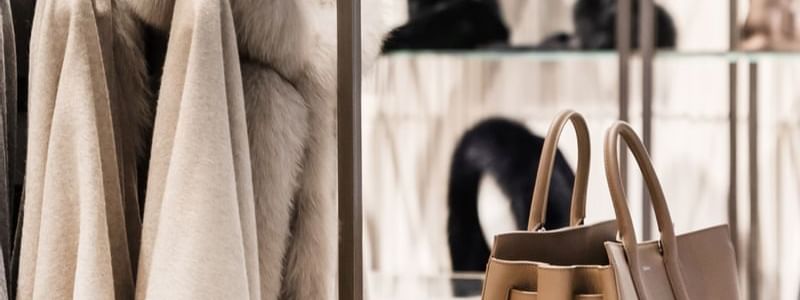 Avenue Louise with fur coats and a luxury handbag on display at Warwick Brussels