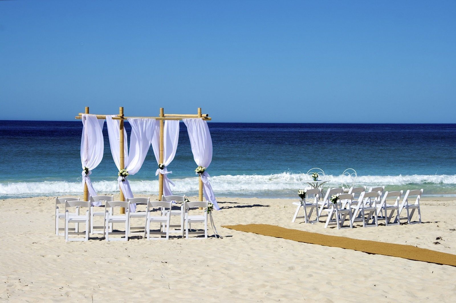 Wedding Ceremony in the beach at Pullman Bunker Bay Resort