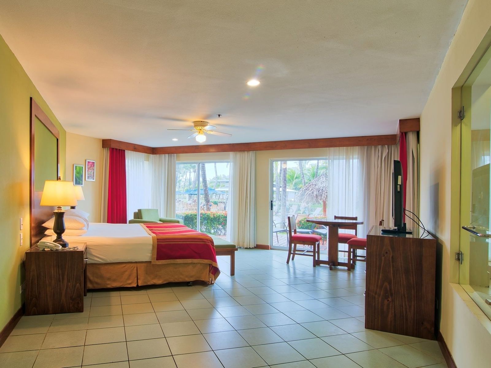Interior of Family Luxury Room with a king bed at Fiesta Resort