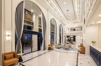 Hotel lobby lounge area with luxury chandelier at Eastin Vientiane Laos