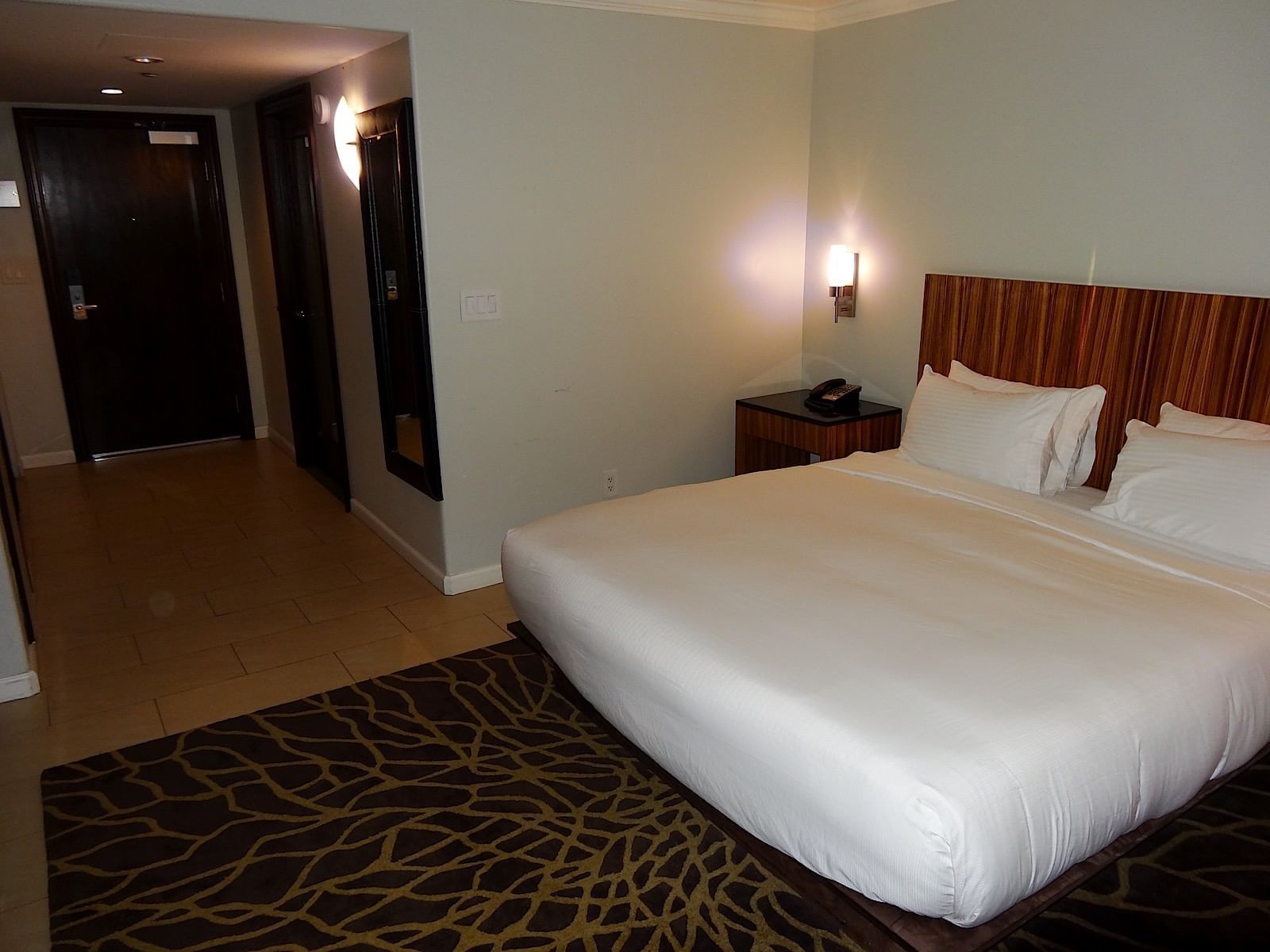 room with hallway to bathroom