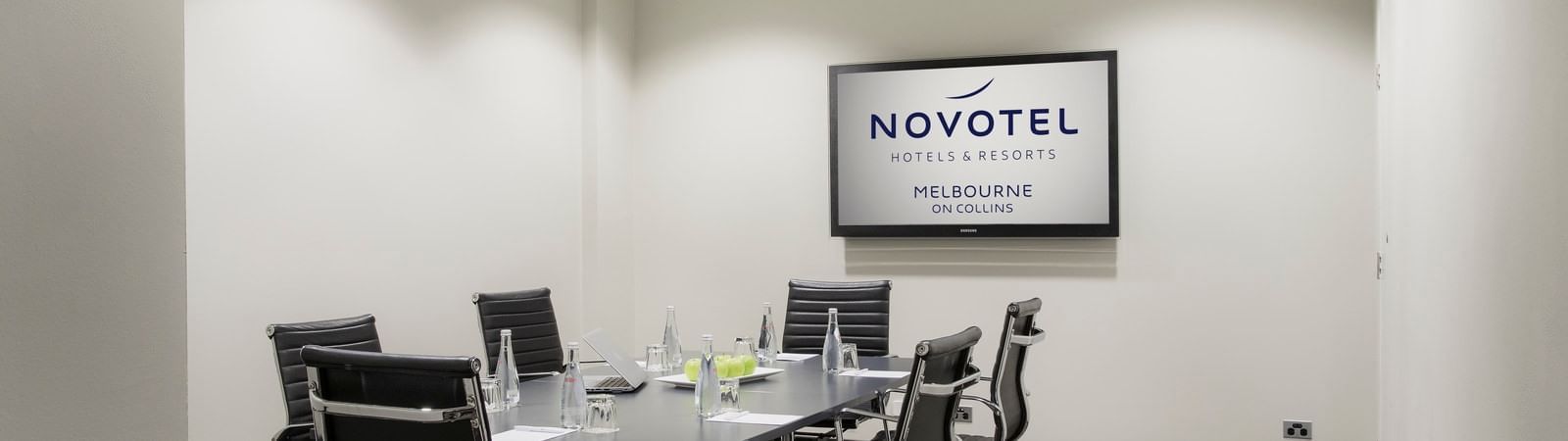 Conference tables setup for event at Novotel Melbourne