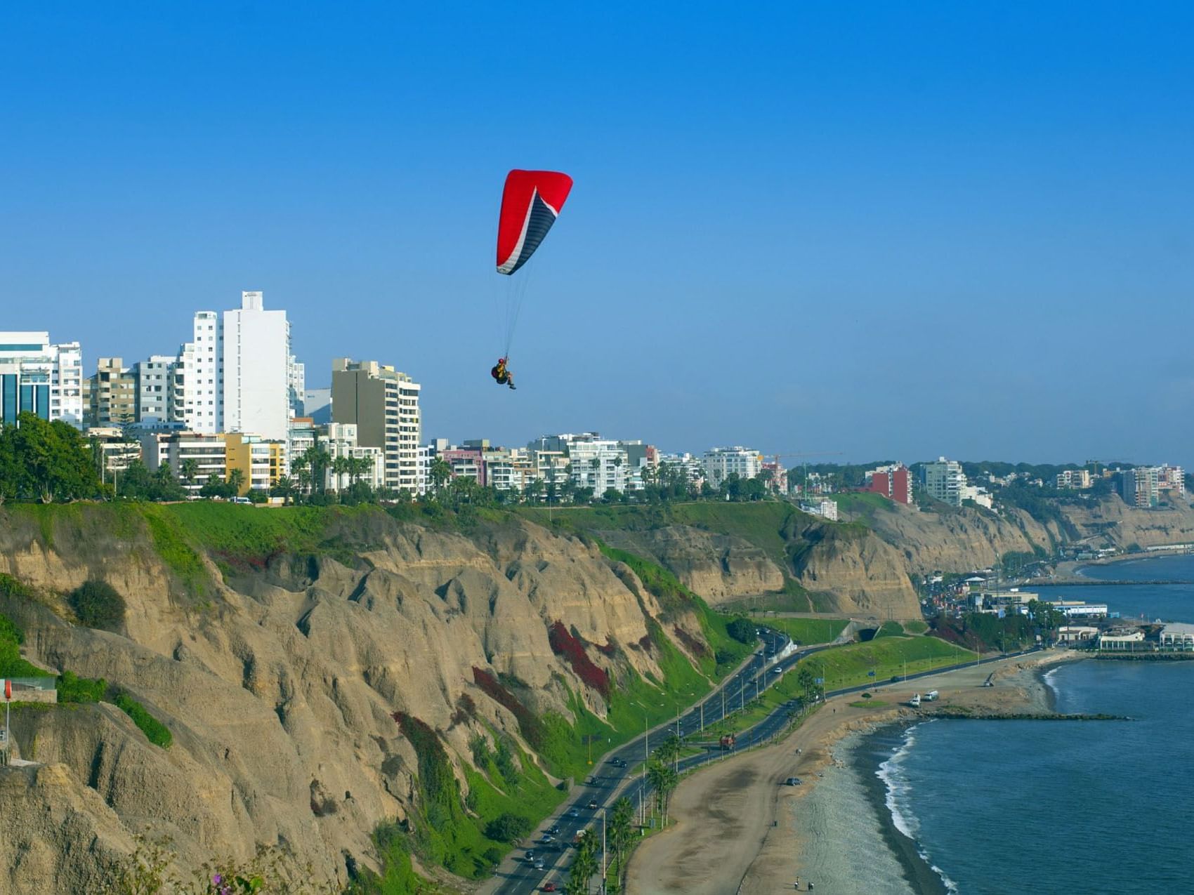 Paragliding over the cliff in Miraflores near Suites Larco 656