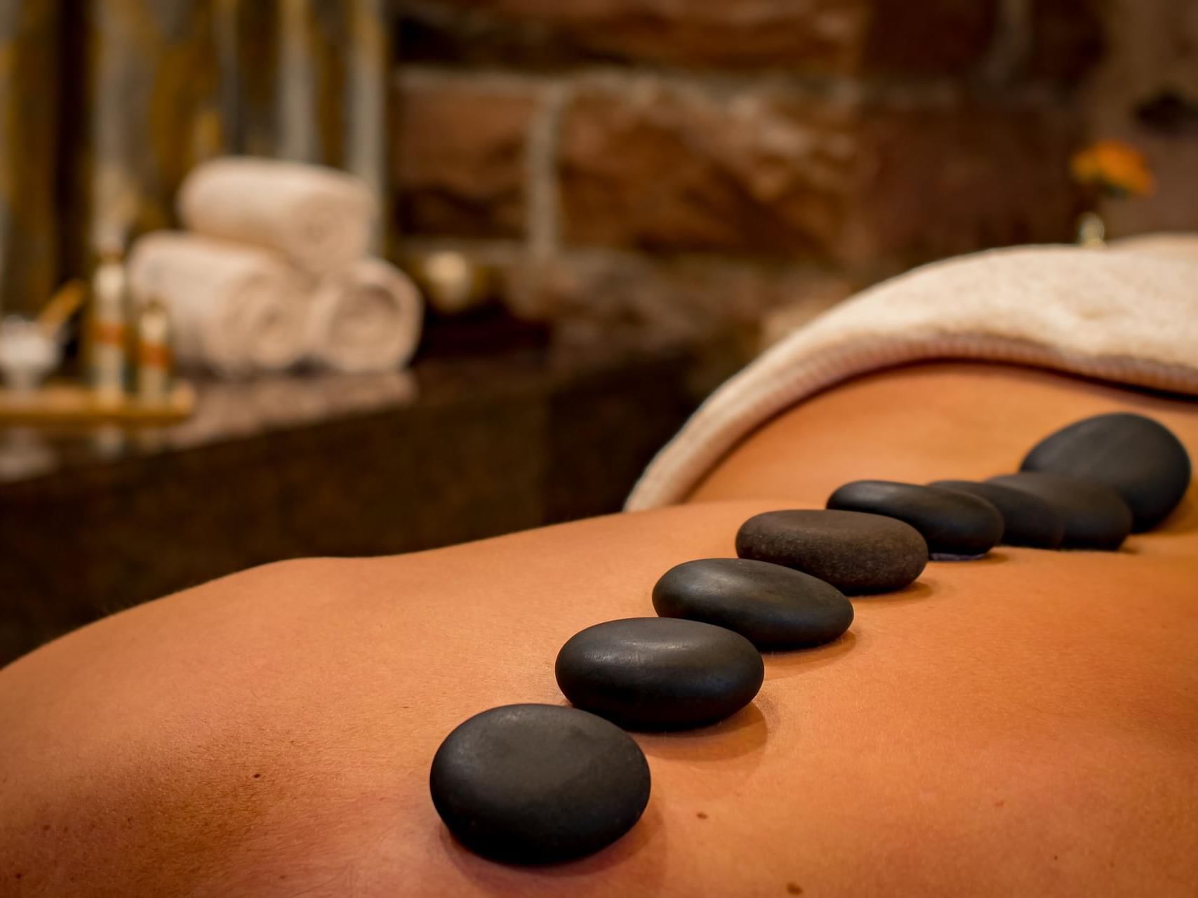 Ongemak Natuur Mexico Hot Stone Massage | Ithaca, NY | August Moon Spa