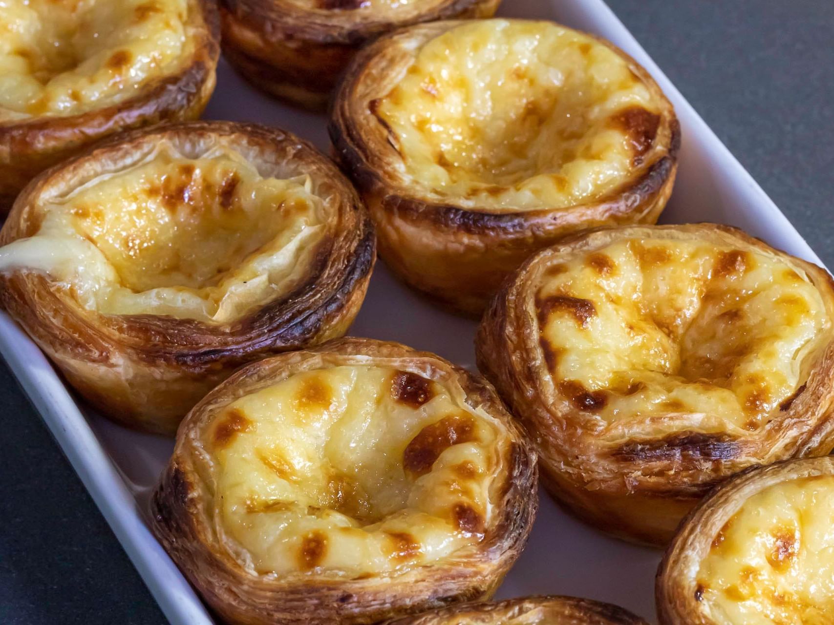 Close-up of freshly backed Pastel de nata at Cardoso Hotel