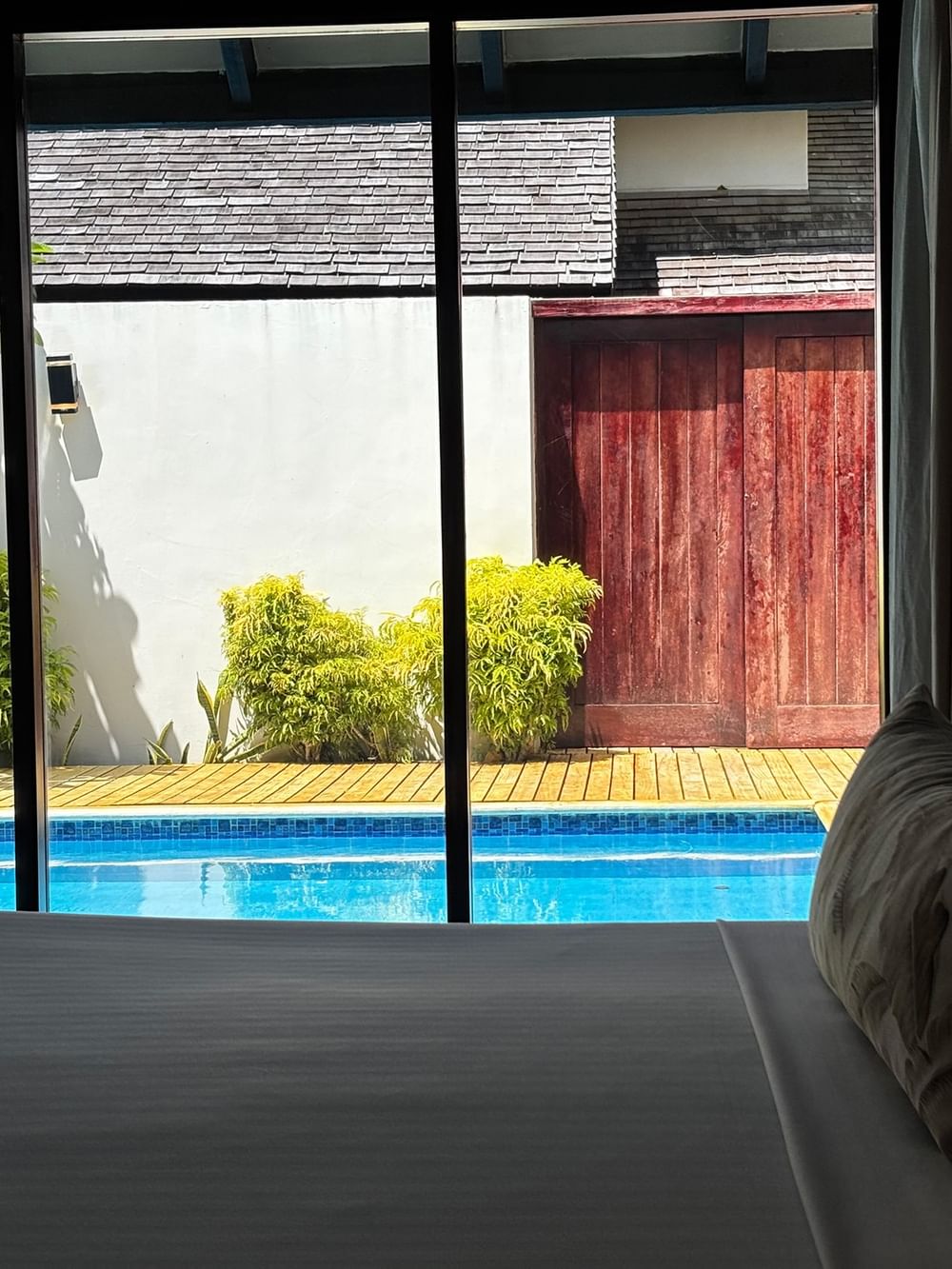 Bedroom view of the Pacific Pool Villa with pool at Warwick Le Lagon in Efate.