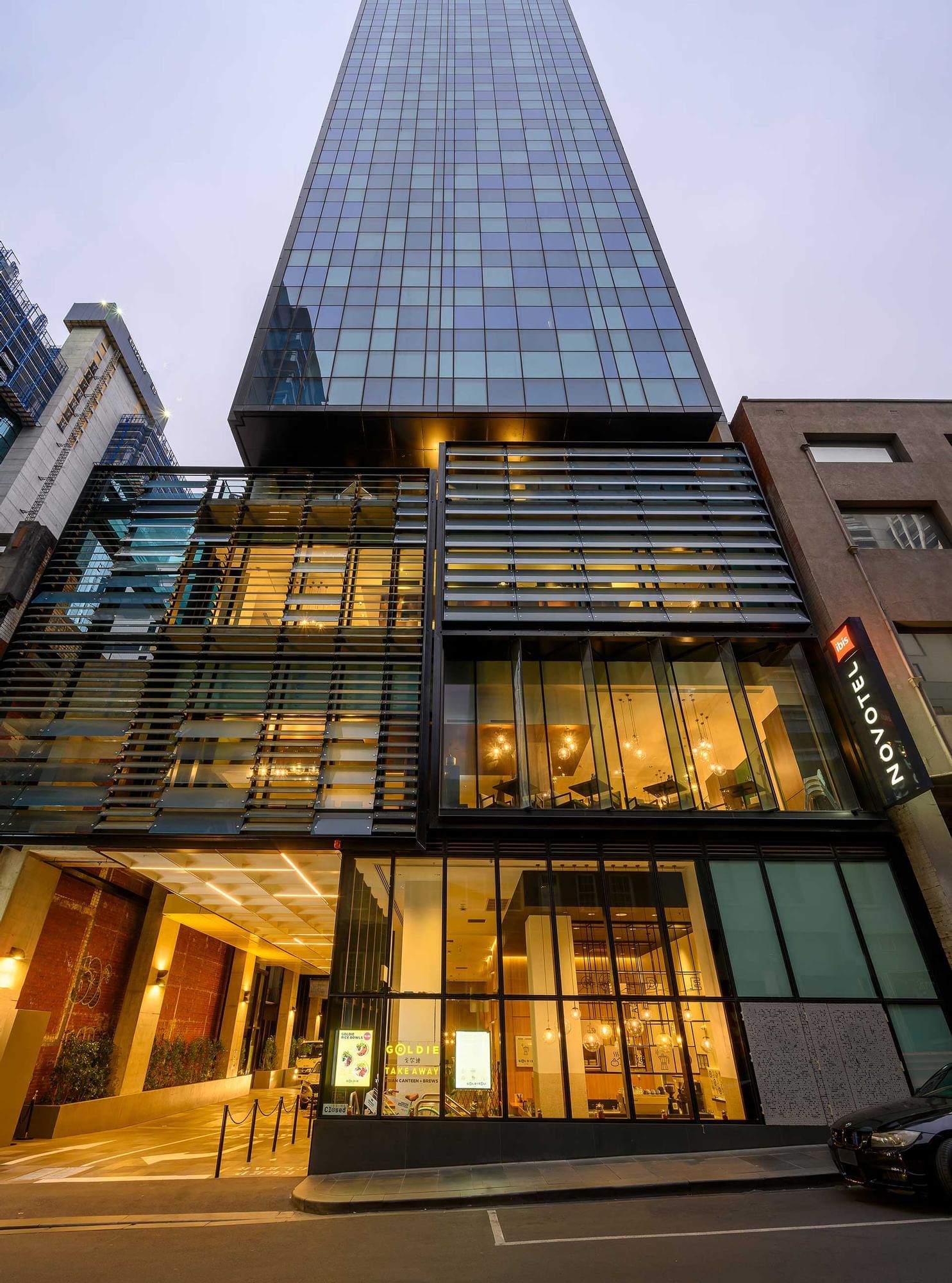 Low-angle shot of the entrance of Melbourne Central Hotels