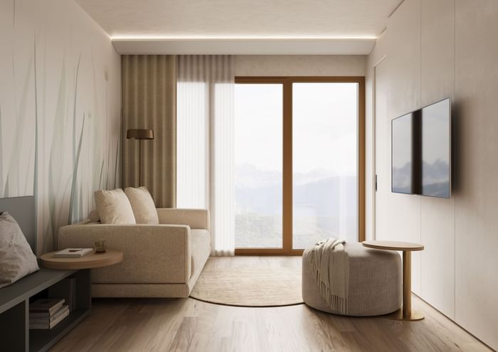 TV lounge with plush seating by the window and wooden floors in 2-rooms apartment / Family stay at Hotel des Innovations