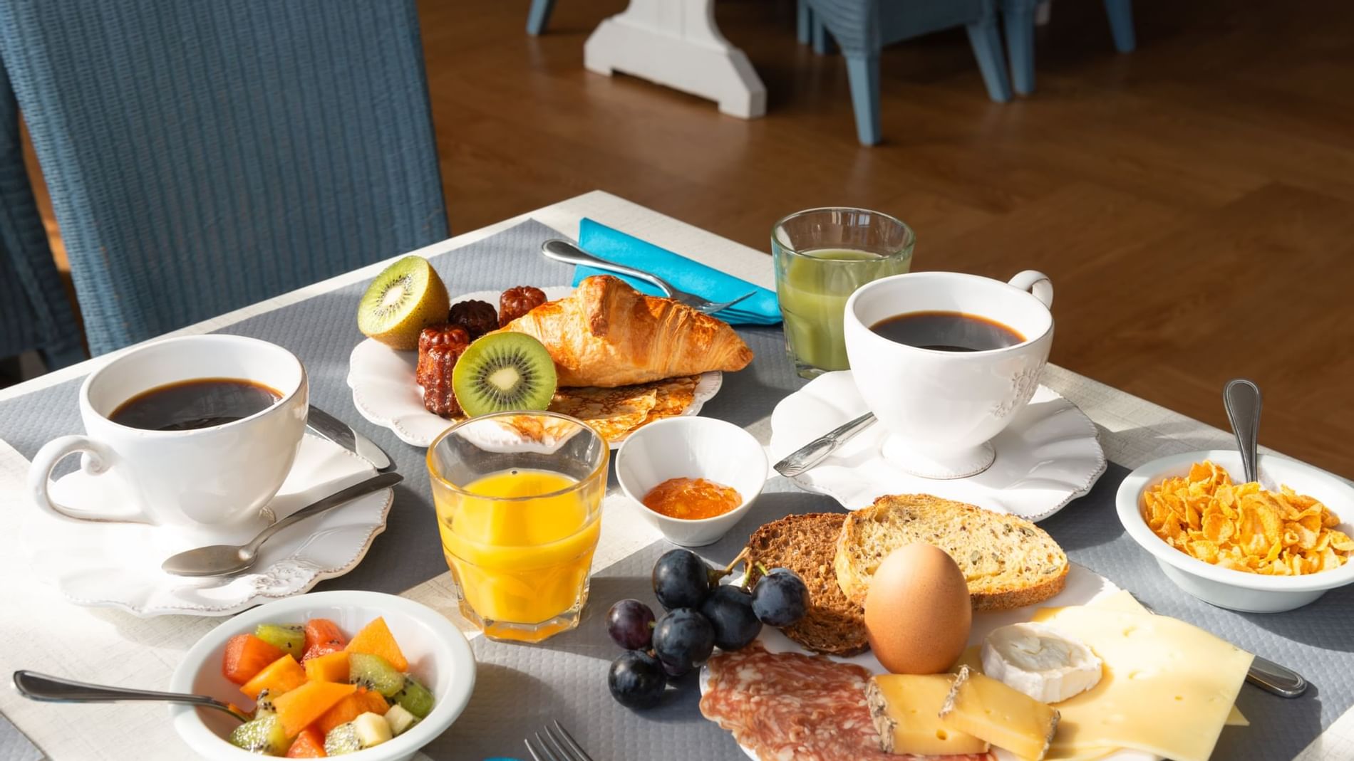 Breakfast with pastry, fruits & drinks at The Originals Hotels