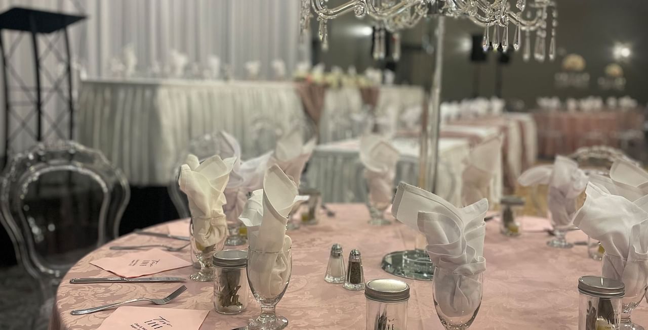 Wedding venue with tables and chairs.