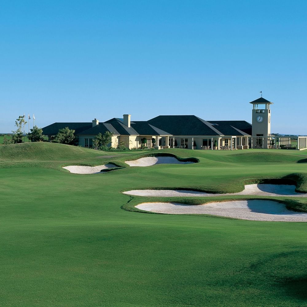 Landscape view of the golf course near Crown Hotels on a sunny day