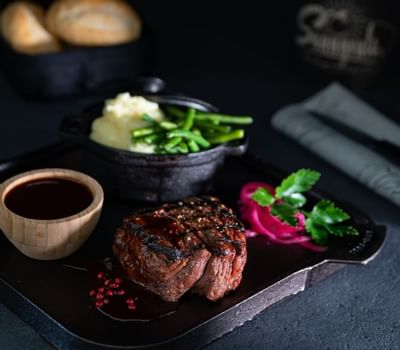 Close-up of Filet Mignon dish served at Amsterdam Manor Resort