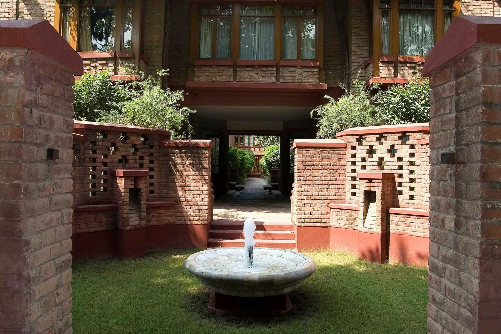 A fountain in the hotel garden at Faisalabad Serena Hotel