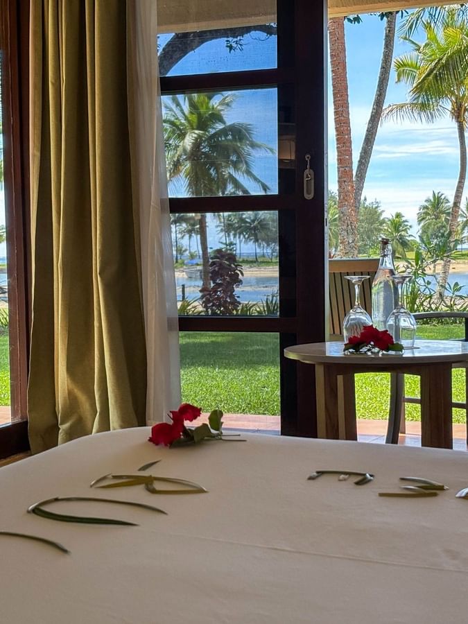 Ocean View Room with bed and balcony at The Naviti Resort in Korolevu.
