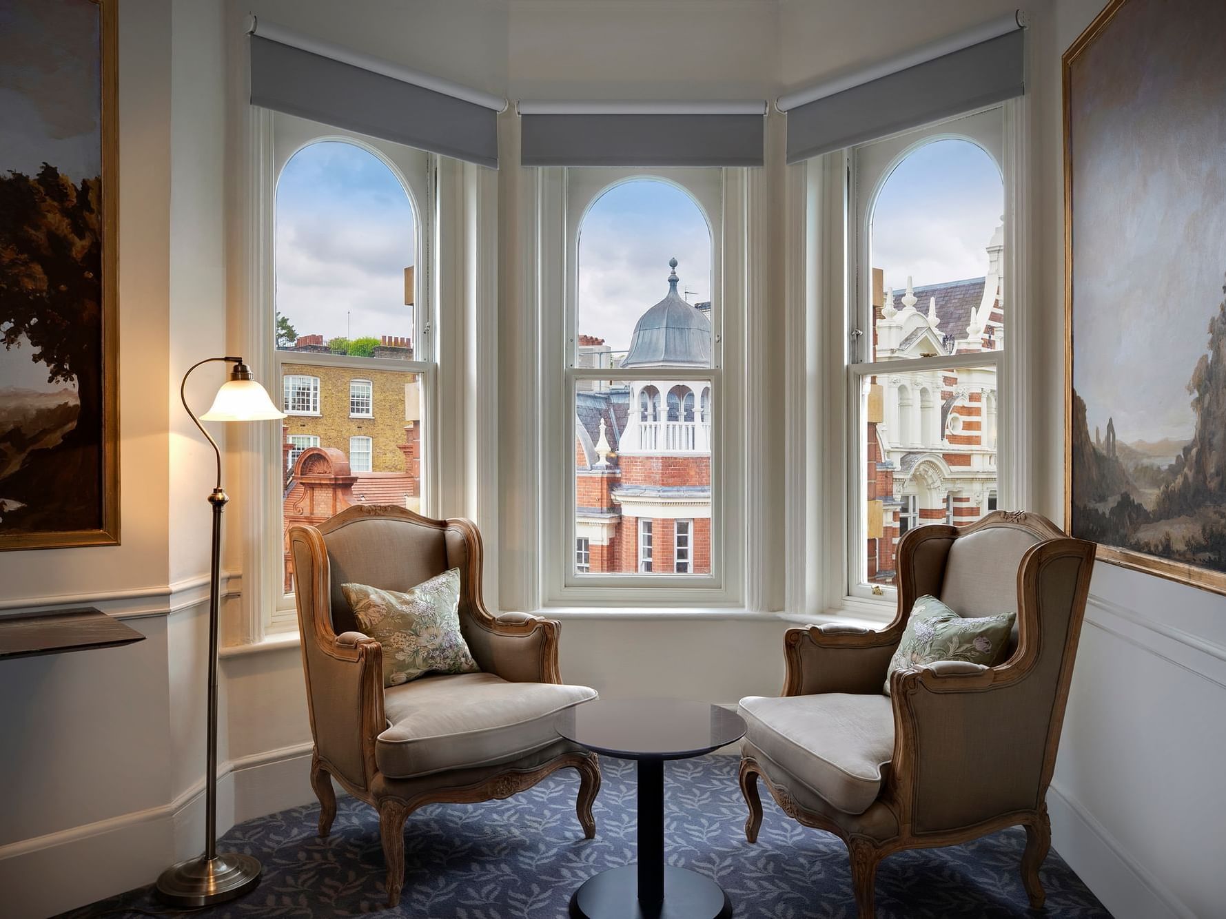 2 ancient chairs & lamp at Junior Suite at Sloane Square Hotel