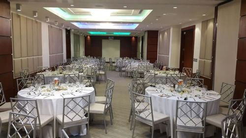banquet room with chairs set up for conference
