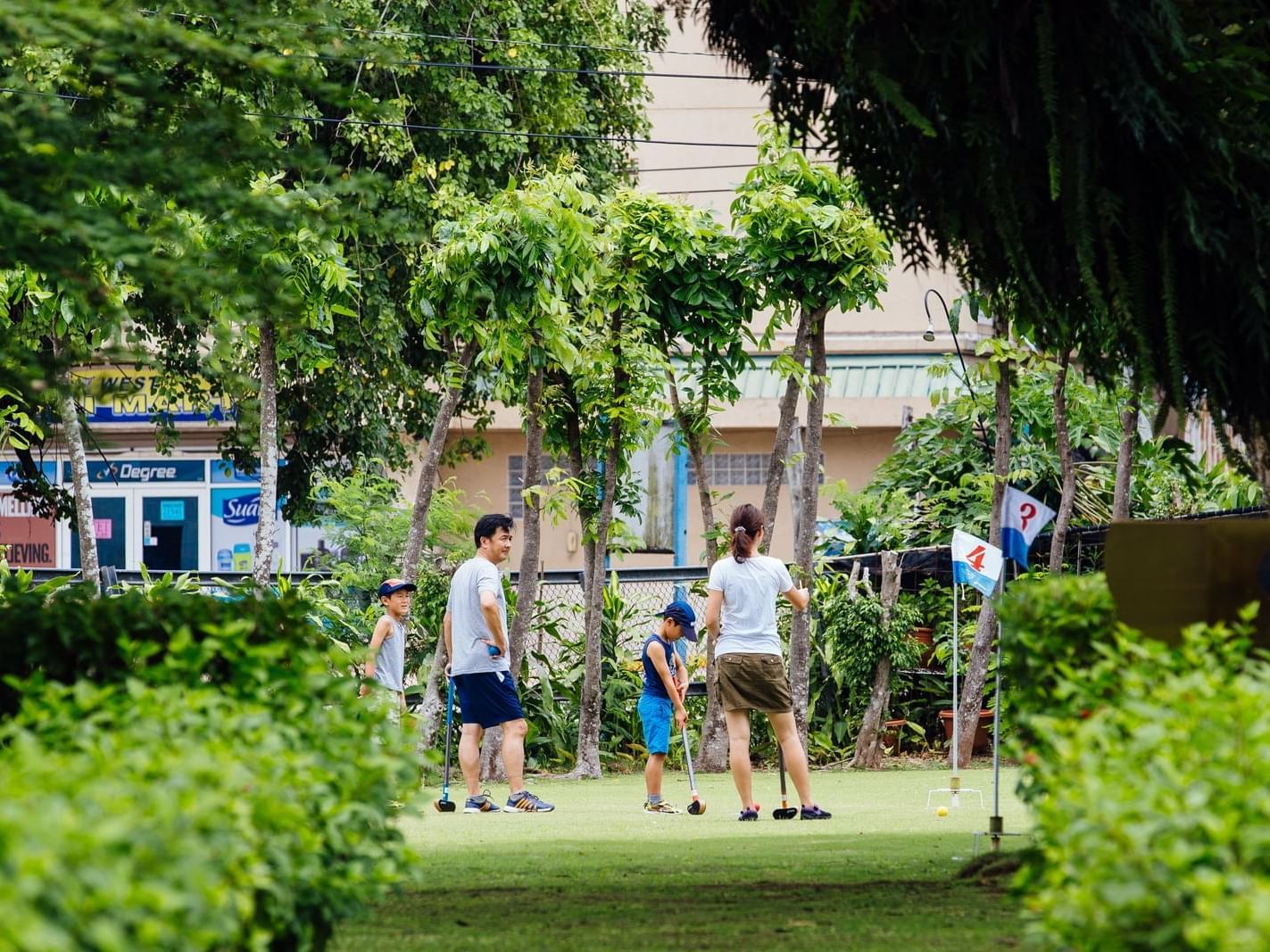 A family playing ground golf at Palau Royal Resort