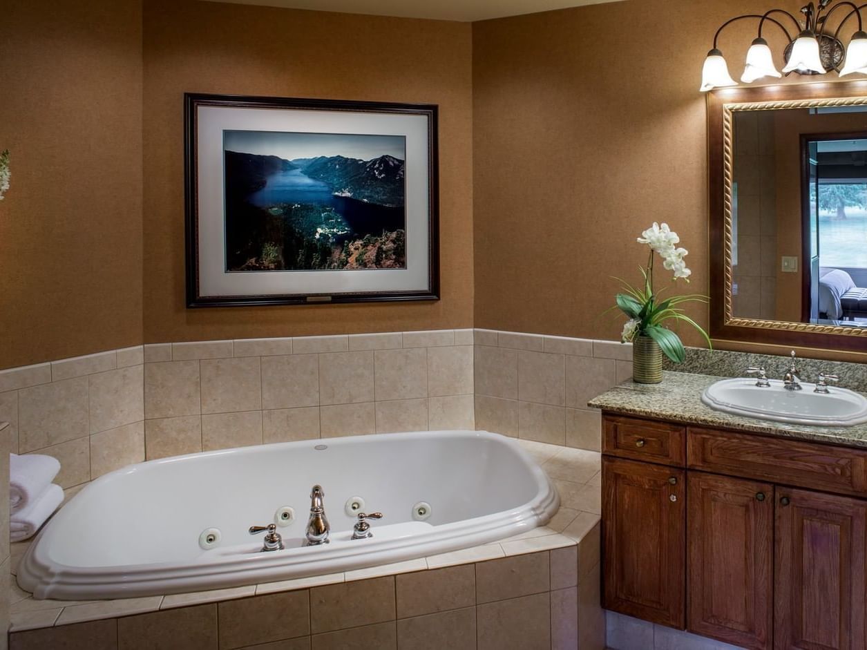 a tub and sink in a bathroom