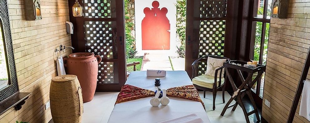 In room Maisha Spa with candles at Serena Beach Resort & Spa