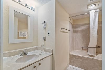 Bathtub with vanity in Signature One Bedroom at The Yachtsman Resort