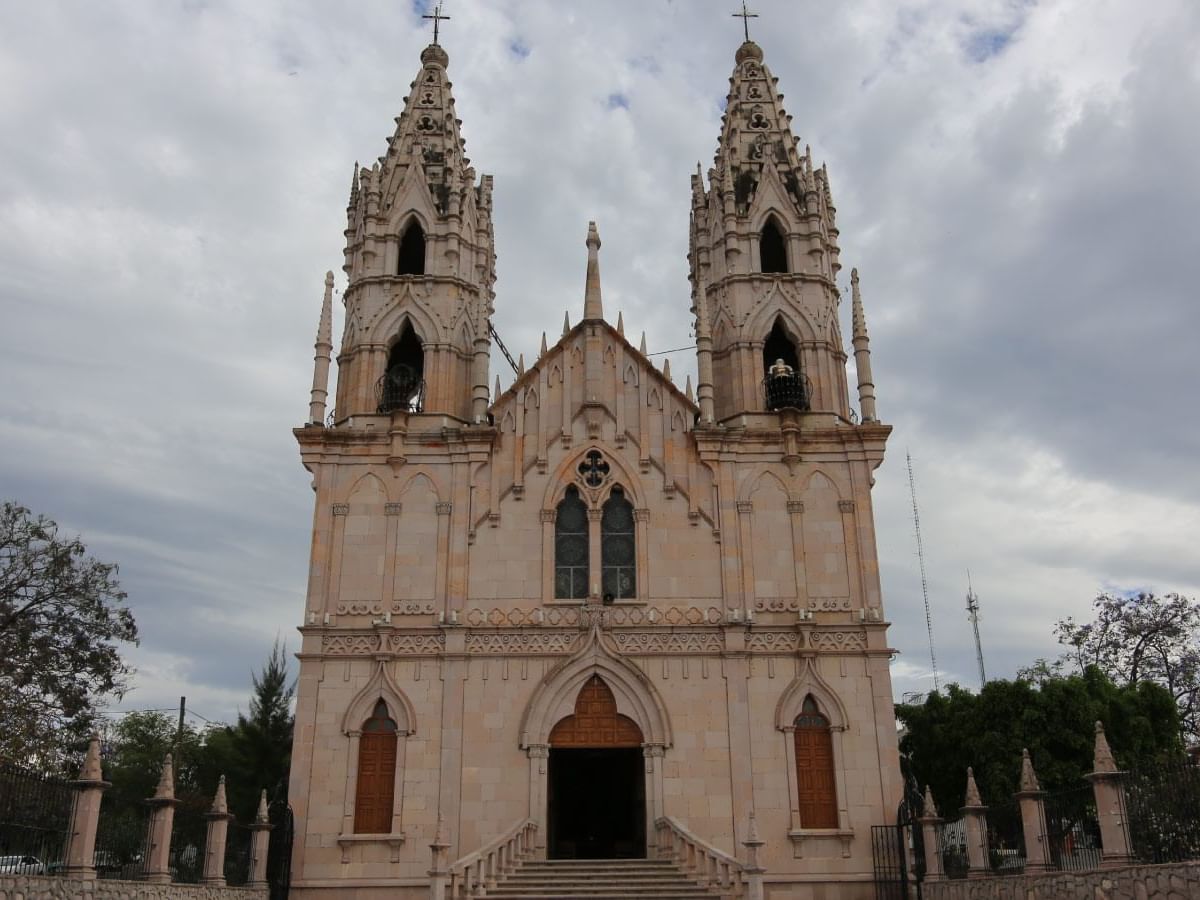 The exterior view of the Catholic church near Gamma Hotels