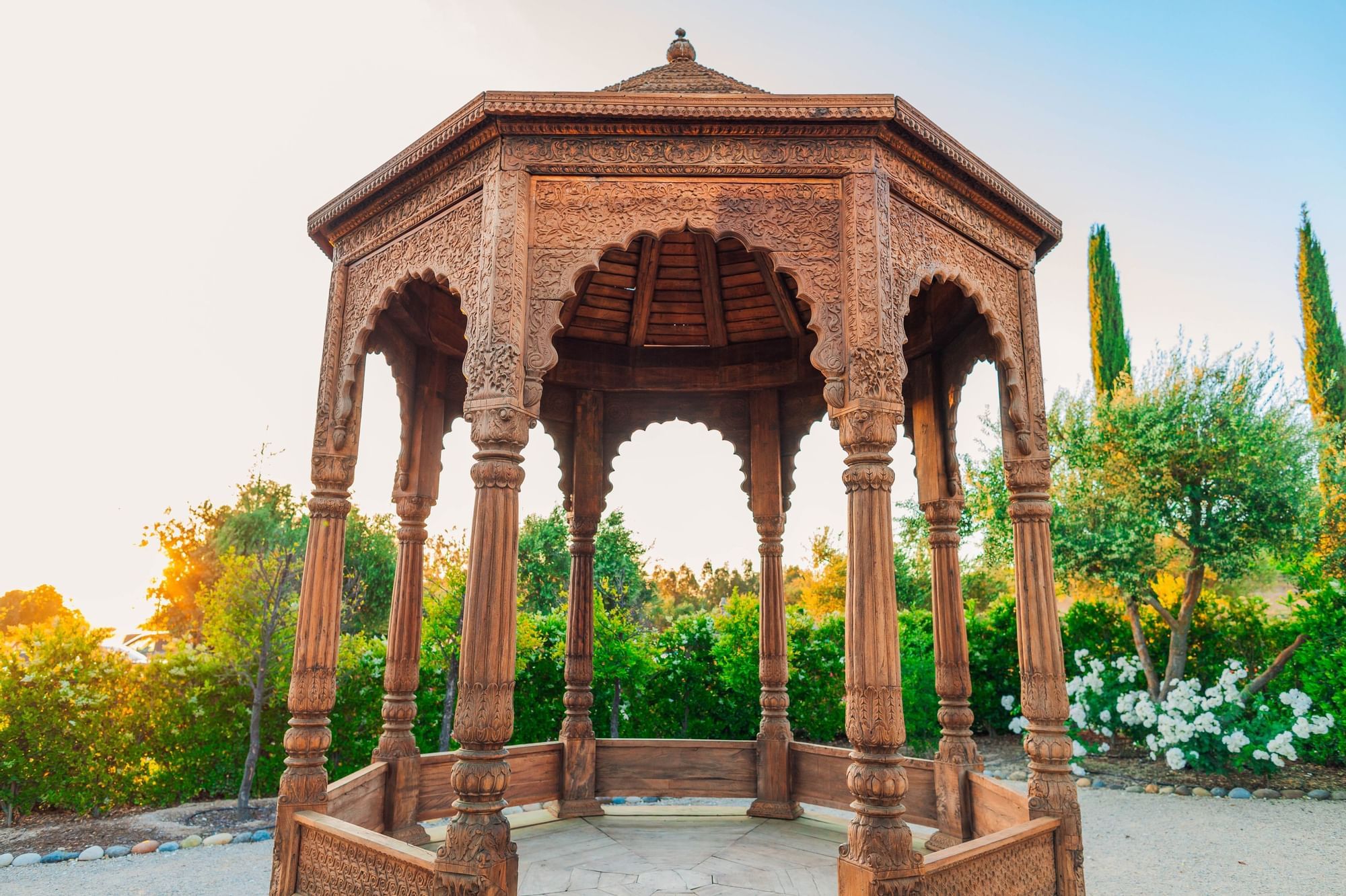 Lorem ipsum Wooden gazebo with intricate details in a garden