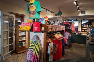 t-shirts and skim boards in a store
