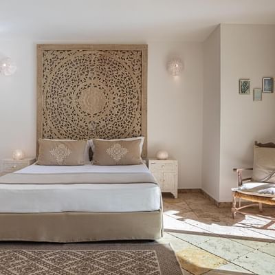 Large bed in Family Suite Garden at Falkensteiner Hotels