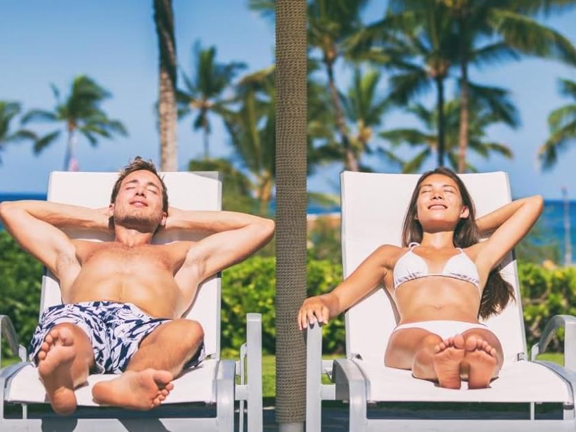 Couple lounging on sunbeds at Safety Harbor Resort & Spa