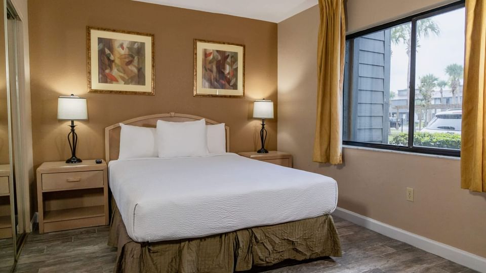 Guest Bed of Two Bedroom suite at Legacy Vacation Resorts