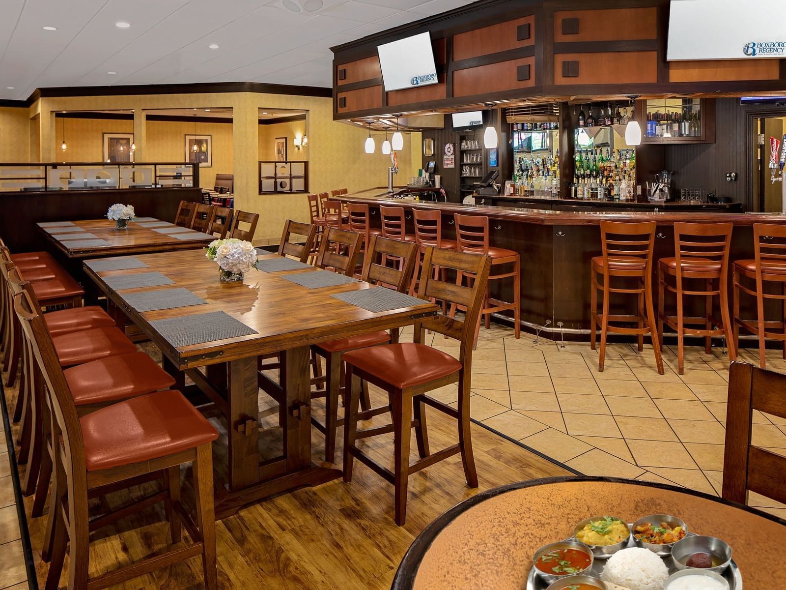 Dining area & Bar at Minuteman Grille at Boxboro Regency Hotel