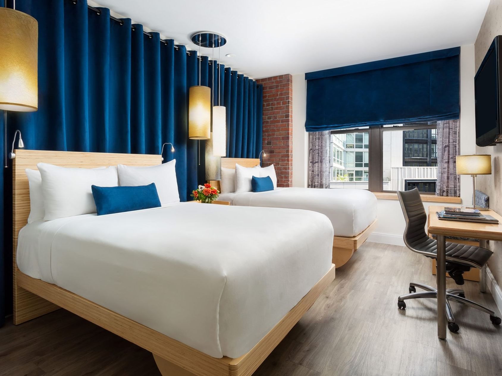 two beds in a hotel room