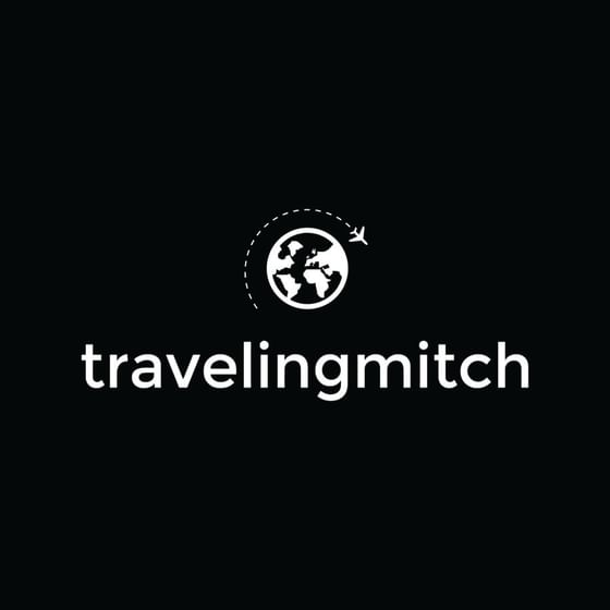 Logo of Traveling Mitch used at Retro Suites Hotel