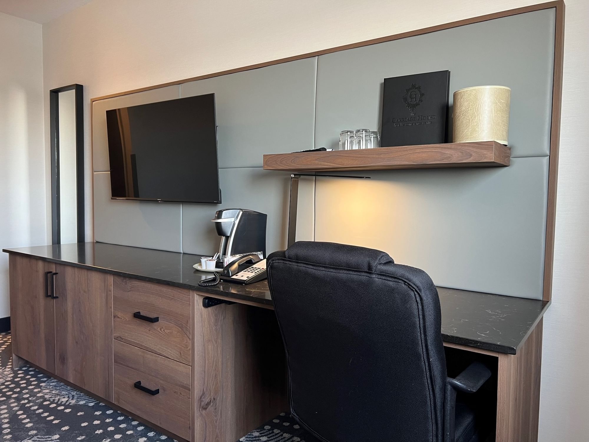 TV & side cupboard in Standard 2 Queen at Carriage House Hotel