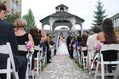 Wedding ceremony at Gazebo outdoor area at Ethan Allen Hotel