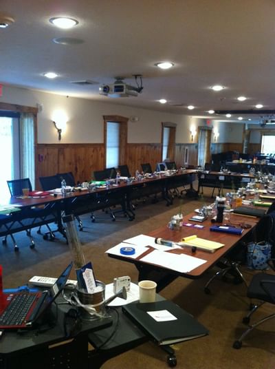 Meeting room with U-shaped table setup.