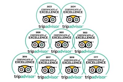 Nine TripAdvisor Certificates of Excellence badges arranged in a pyramid from 2016 to 2024.