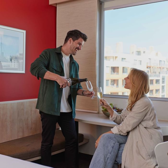 Couple in room at ibis Darling Harbour