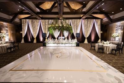 White dance floor and elegant interior with decors for a wedding at Stein Eriksen Lodge
