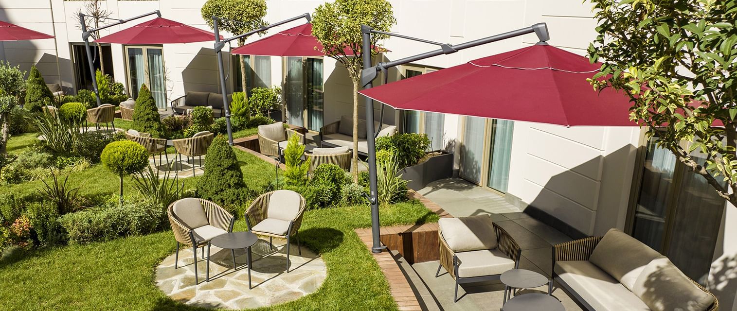 Two massage beds with a tray of amenities in Safira Spa & Fitness at CVK Park Prestige Suites Istanbul